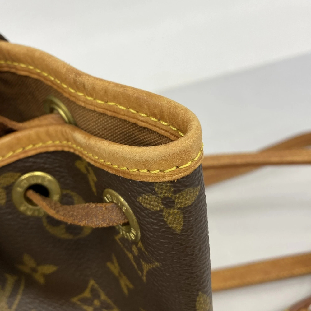 LOUIS VUITTON Brown Monogram Backpack - Picture 10 of 11